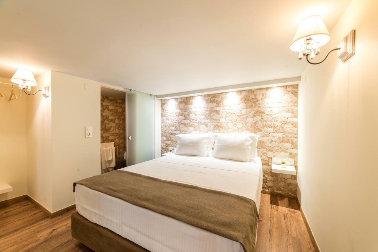 פוטוס Oinoelia Luxury Suites & Residence מראה חיצוני תמונה