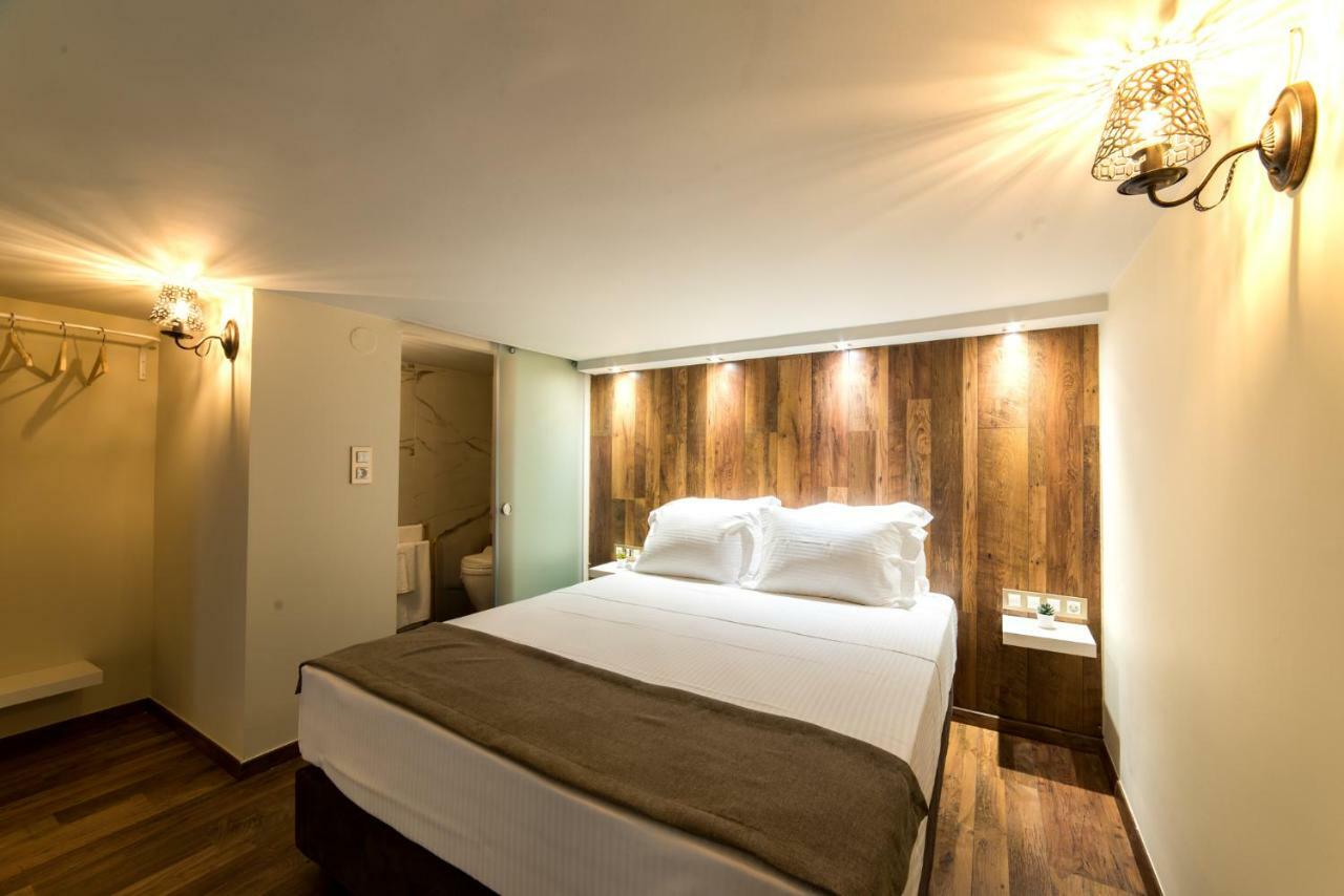 פוטוס Oinoelia Luxury Suites & Residence מראה חיצוני תמונה