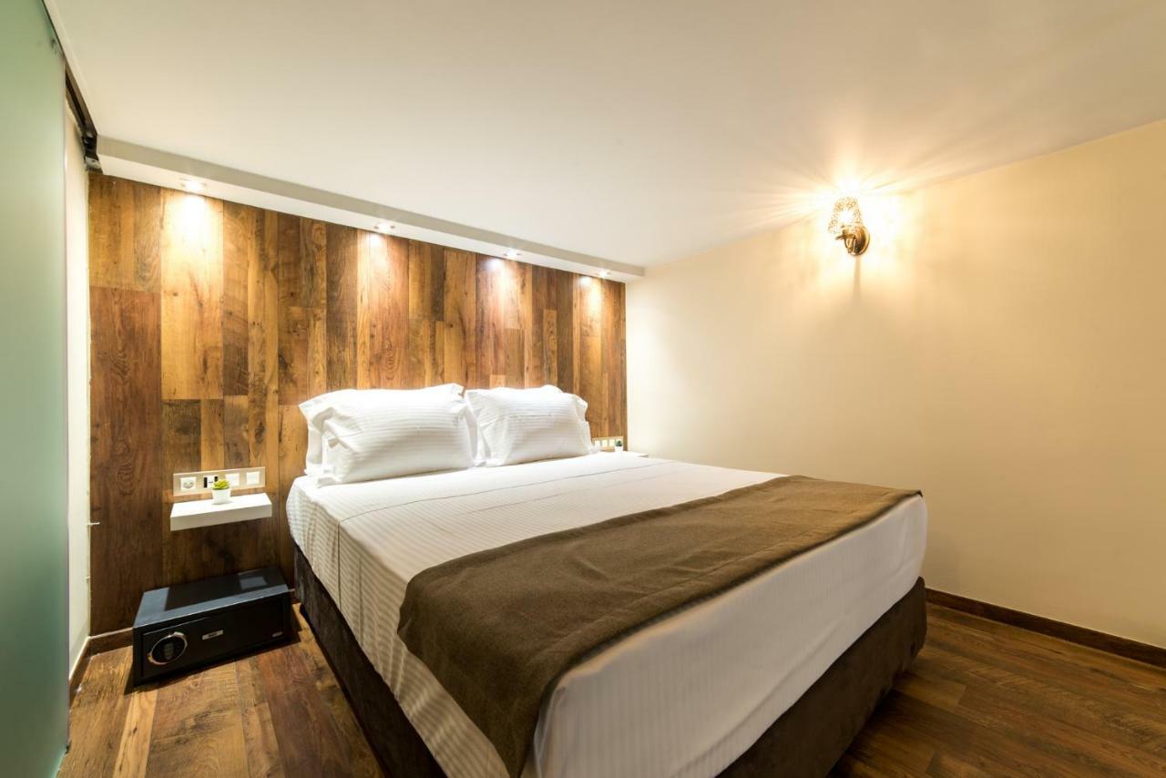 פוטוס Oinoelia Luxury Suites & Residence מראה חיצוני תמונה